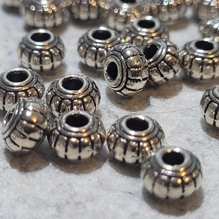 Perle Metall Tibetsilber Style, 6x4,5mm
