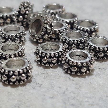 Zwischenperle Metall 9x4,5mm, 15Stk.