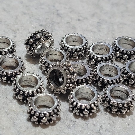 Zwischenperle Metall 9x4,5mm, 15Stk.